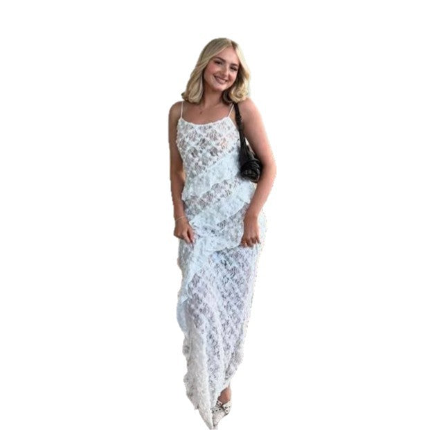 Damer Elegant spets maxiklänning med asymmetrisk drapering Mirla-Eva Jonsson
