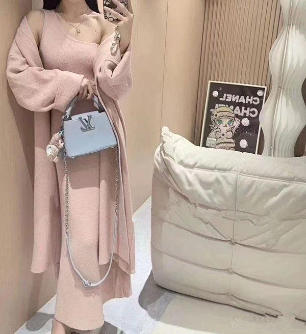 Damer Elegant stickad kappa med bred passform och praktiska fickor Eva Jonsson-Eva Jonsson