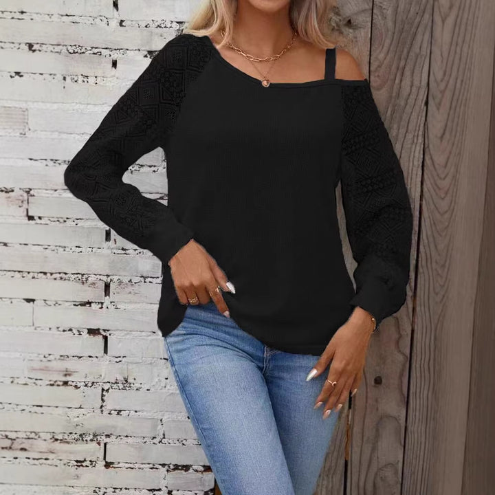 Damer Elegant stickad topp med asymmetrisk halsringning och dekorerade ärmar Mirla-Eva Jonsson