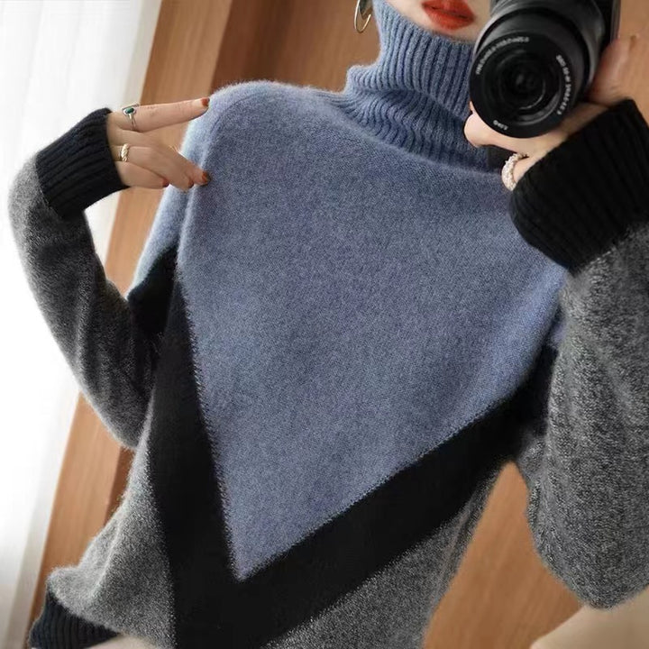 Damer Elegant stickad tröja med hög krage och grafisk design Mirla-Eva Jonsson