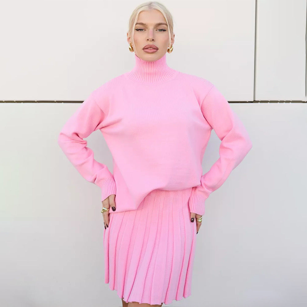 Damer Elegant stickad tröja med hög krage och matchande kjol Mirla-Eva Jonsson