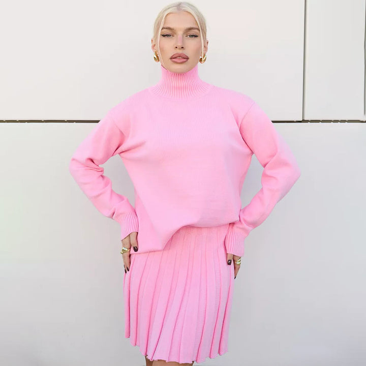 Damer Elegant stickad tröja med hög krage och matchande kjol Mirla-Eva Jonsson
