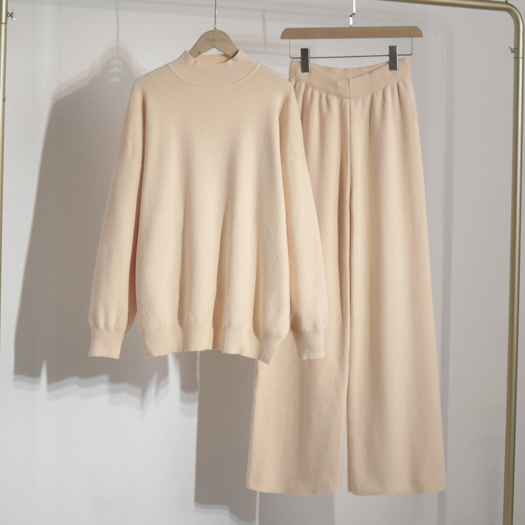 Damer Elegant stickensemble med hög krage tröja och vida byxor Mirla-Eva Jonsson
