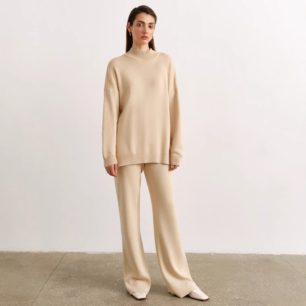Damer Elegant stickensemble med hög krage tröja och vida byxor Mirla-Eva Jonsson