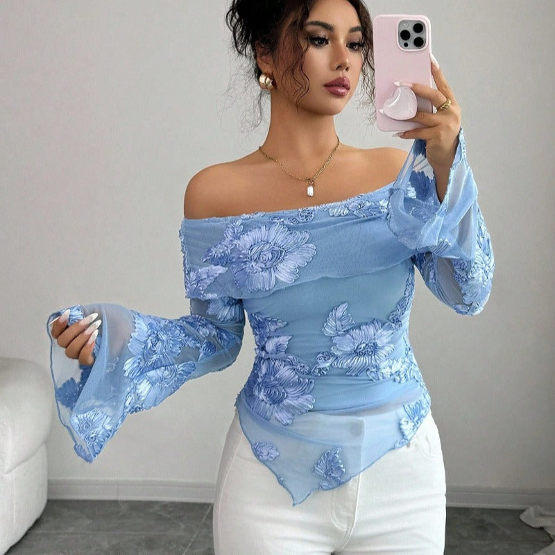 Damer Elegant topp med axelrörande design och blommönster Mirla-Eva Jonsson