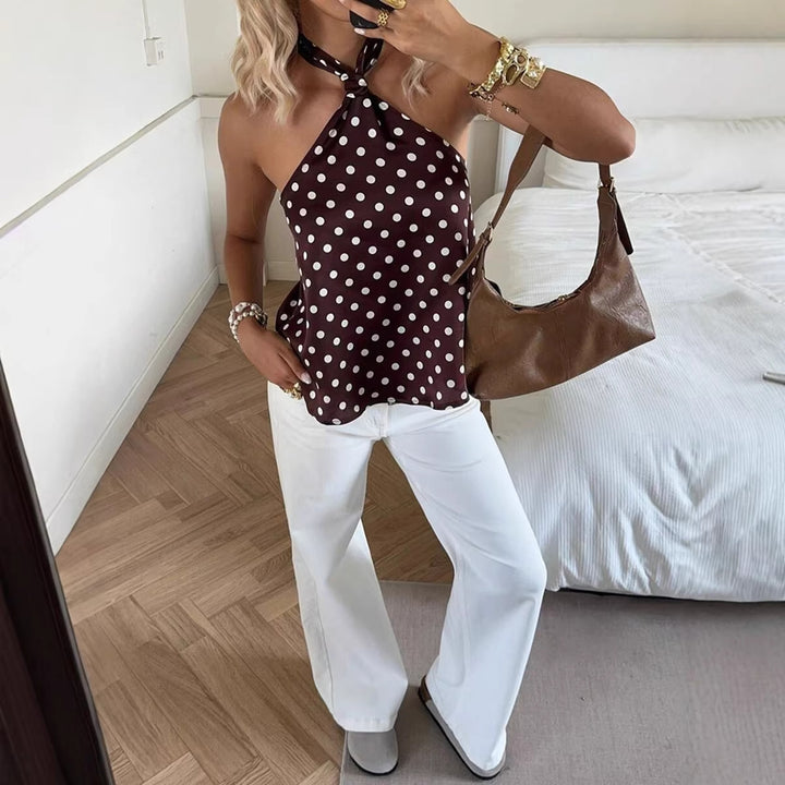 Damer Elegant topp med en off-shoulder design och lekfullt prickmönster Mirla-Eva Jonsson