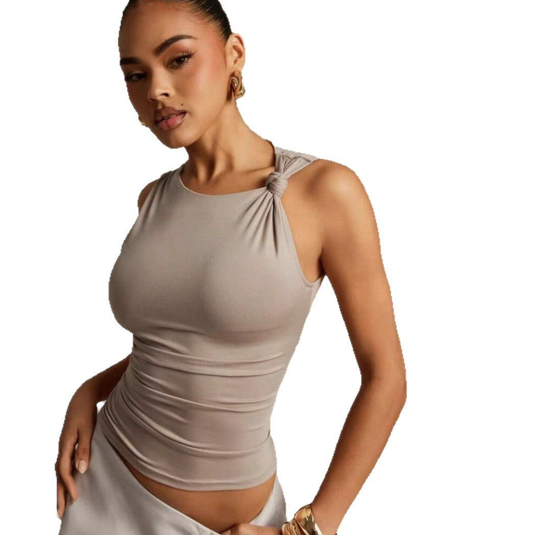 Damer Elegant topp med knutdetalj och figurnära skärning Mirla-Eva Jonsson