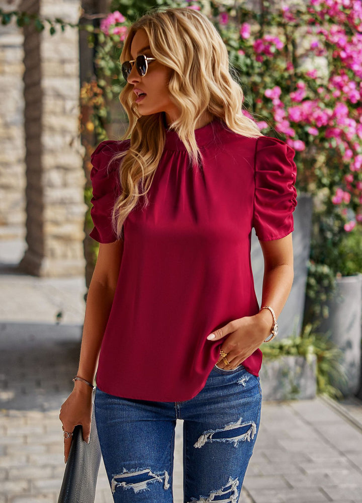 Damer Elegant topp med puffärmar och subtila volangdetaljer Mirla-Eva Jonsson