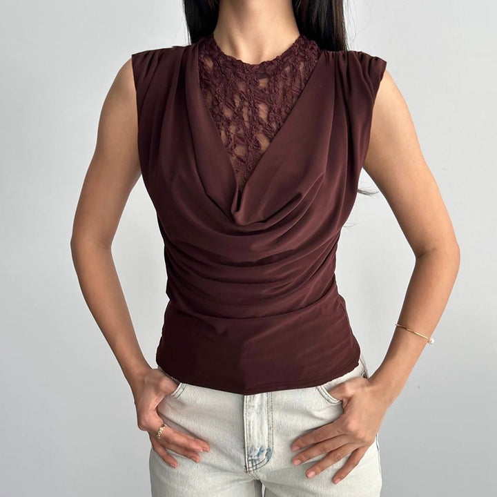 Damer Elegant topp med sofistikerad spetsdetalj Mirla-Eva Jonsson