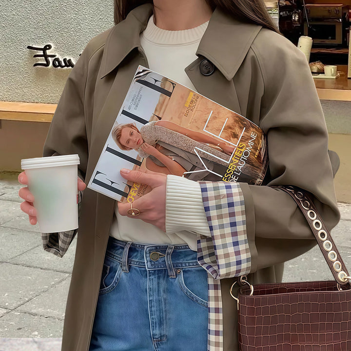 Damer Elegant trenchcoat med rutigt foder och vid passform Mirla-Eva Jonsson
