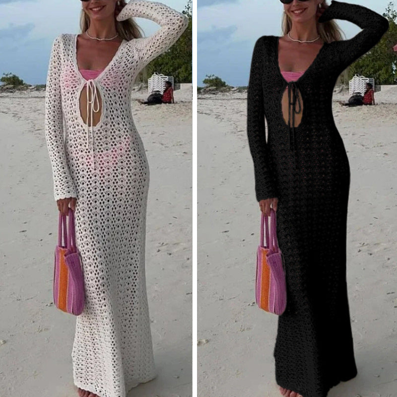 Damer Elegant virkade strandklänning med djup V-ringning och luftig struktur Mirla-Eva Jonsson