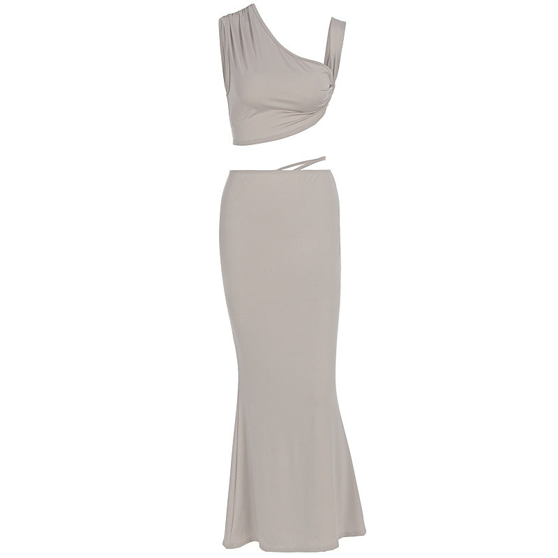 Damer Elegant wrap klänning med asymmetrisk skärning och figurnära design Mirla-Eva Jonsson