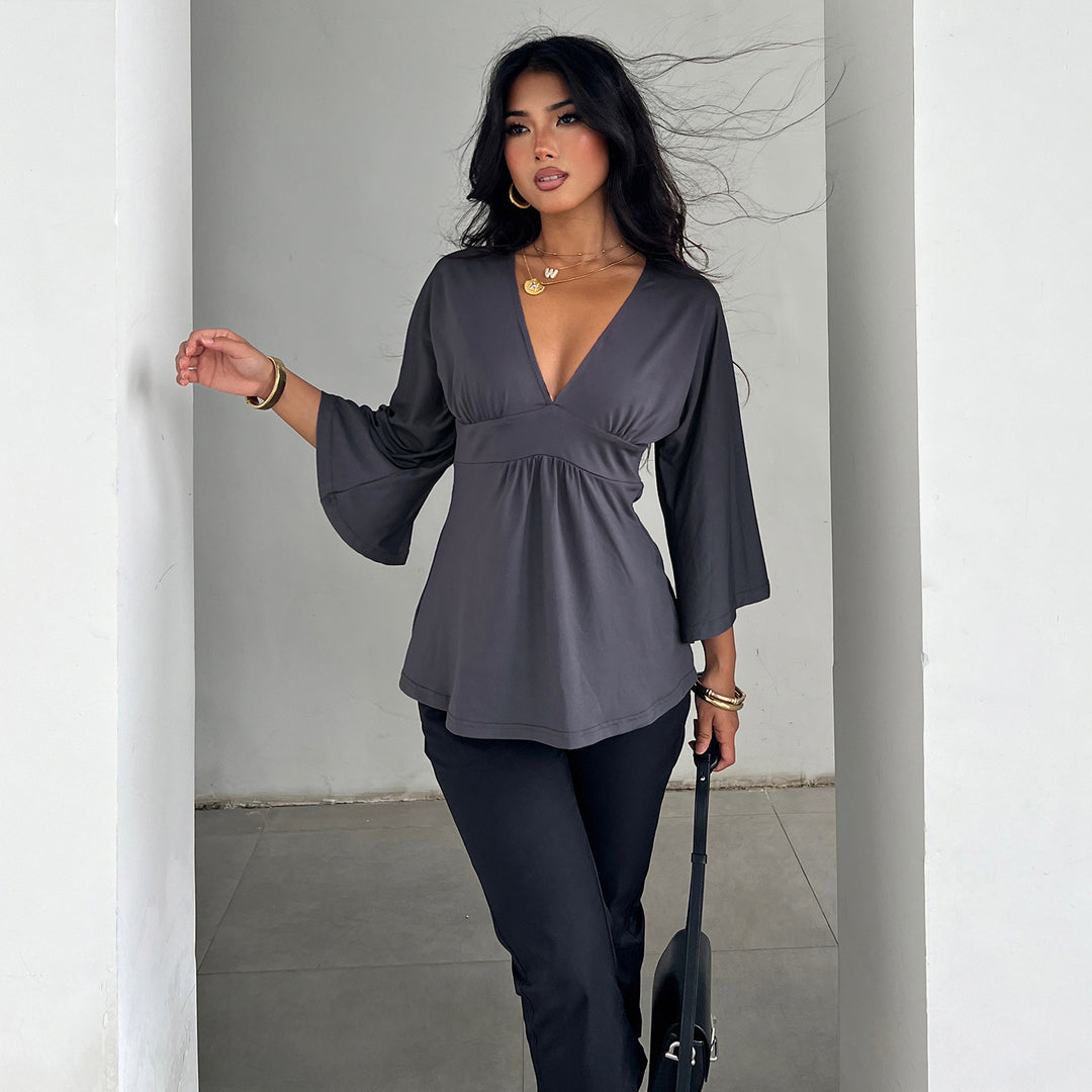 Damer Elegant wrap top med vida ärmar och V-ringning Mirla-Eva Jonsson