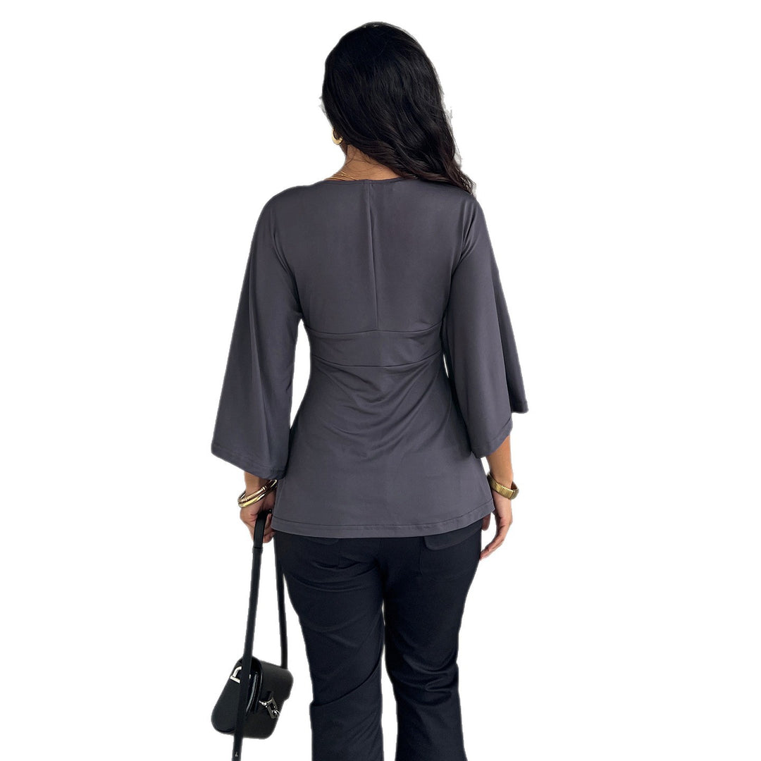 Damer Elegant wrap top med vida ärmar och V-ringning Mirla-Eva Jonsson