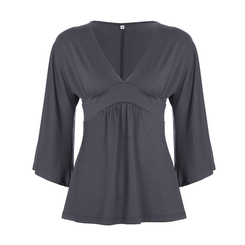 Damer Elegant wrap top med vida ärmar och V-ringning Mirla-Eva Jonsson