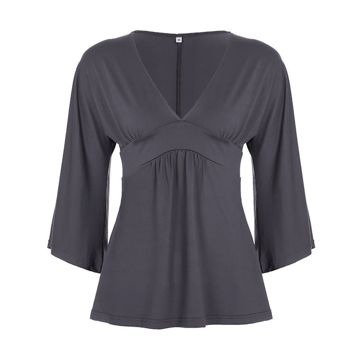 Damer Elegant wrap top med vida ärmar och V-ringning Mirla-Eva Jonsson