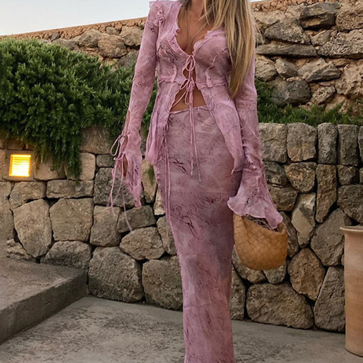 Damer Eleganta Cut-Out Maxiklänning med flödande tyg och raffinerade volangdetaljer Mirla-Eva Jonsson