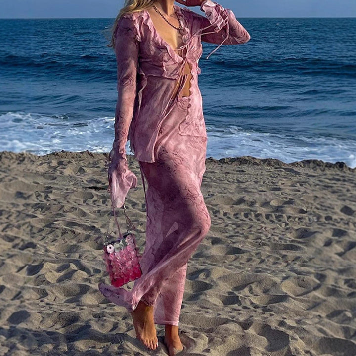 Damer Eleganta Cut-Out Maxiklänning med flödande tyg och raffinerade volangdetaljer Mirla-Eva Jonsson