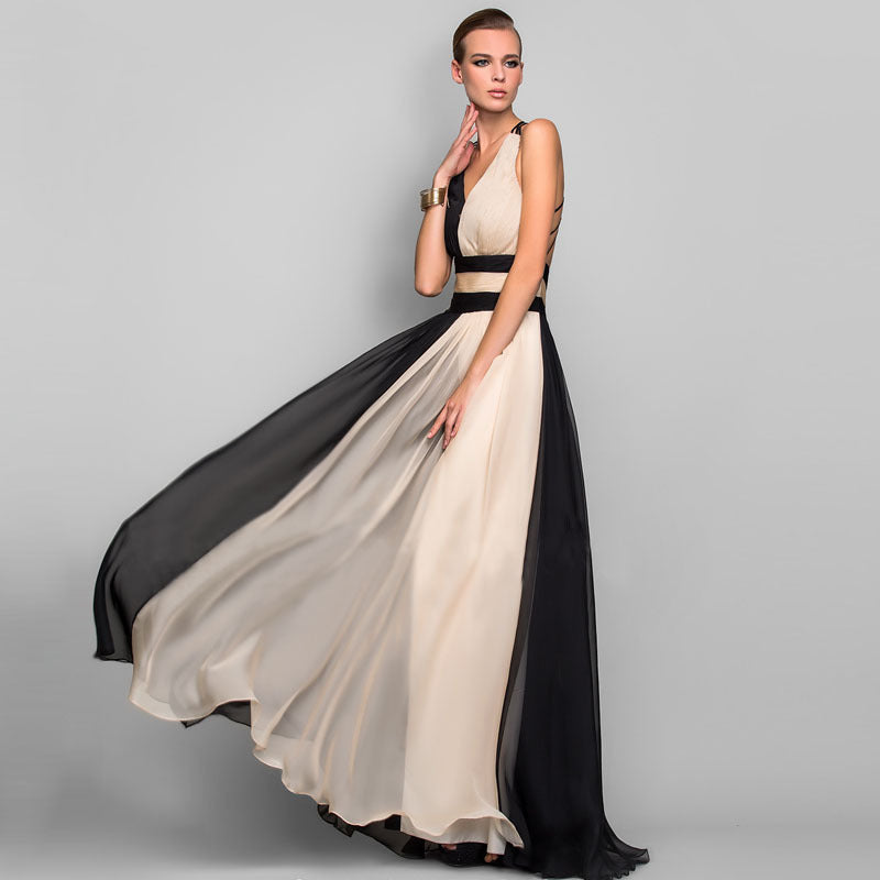 Damer Eleganta Maxi-klänning med Asymmetrisk Design och Djup V-hals Mirla-Eva Jonsson