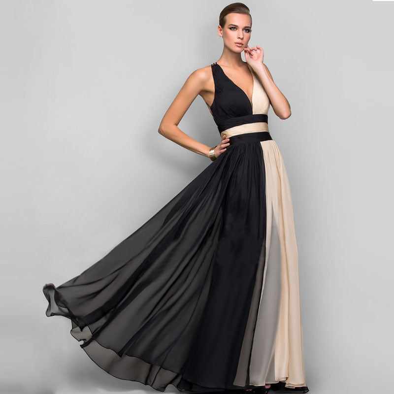 Damer Eleganta Maxi-klänning med Asymmetrisk Design och Djup V-hals Mirla-Eva Jonsson