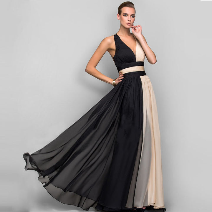 Damer Eleganta Maxi-klänning med Asymmetrisk Design och Djup V-hals Mirla-Eva Jonsson