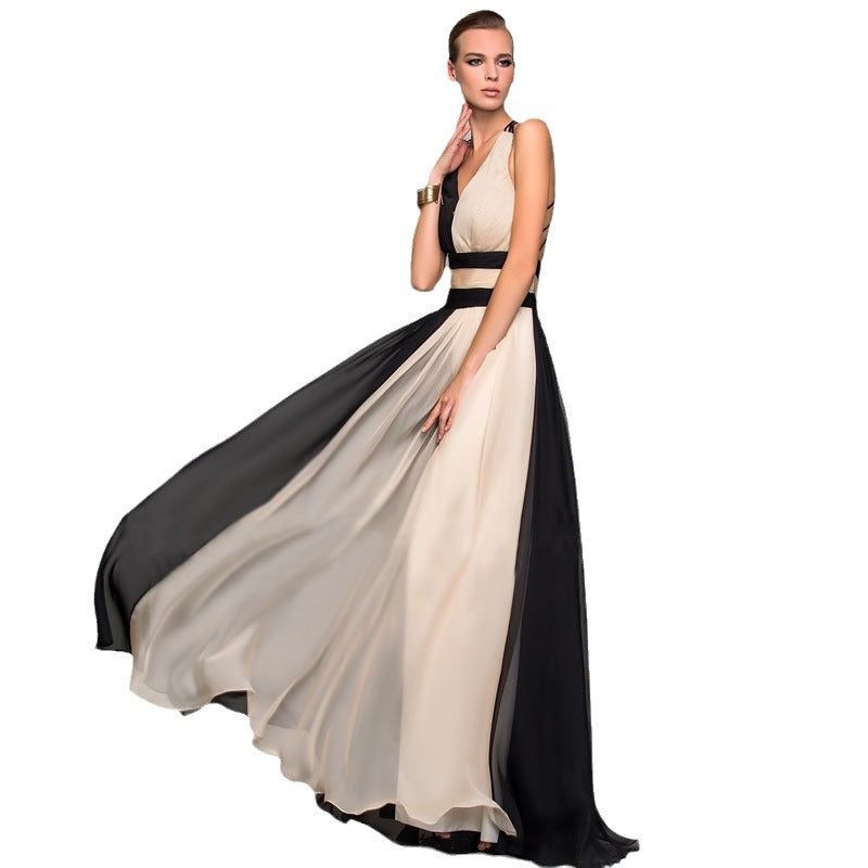 Damer Eleganta Maxi-klänning med Asymmetrisk Design och Djup V-hals Mirla-Eva Jonsson