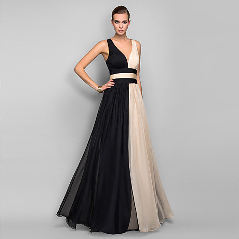 Damer Eleganta Maxi-klänning med Asymmetrisk Design och Djup V-hals Mirla-Eva Jonsson