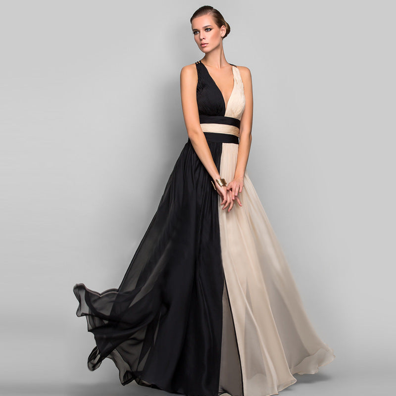 Damer Eleganta Maxi-klänning med Asymmetrisk Design och Djup V-hals Mirla-Eva Jonsson