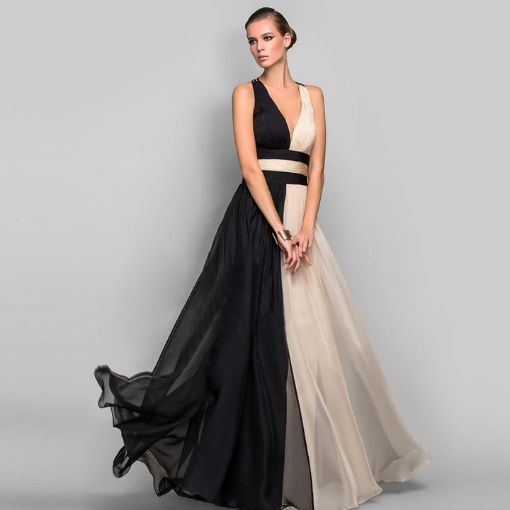 Damer Eleganta Maxi-klänning med Asymmetrisk Design och Djup V-hals Mirla-Eva Jonsson