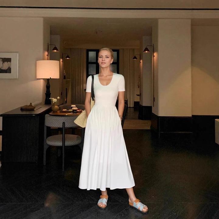 Damer Eleganta Maxiklänning med hög uringning och harmonisk skärning Mirla-Eva Jonsson