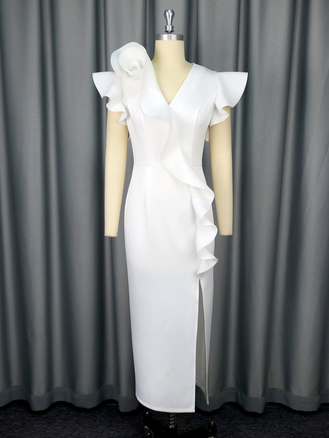 Damer Eleganta Midi-klänning med asymmetrisk volangdesign och blommig accent Mirla-Eva Jonsson