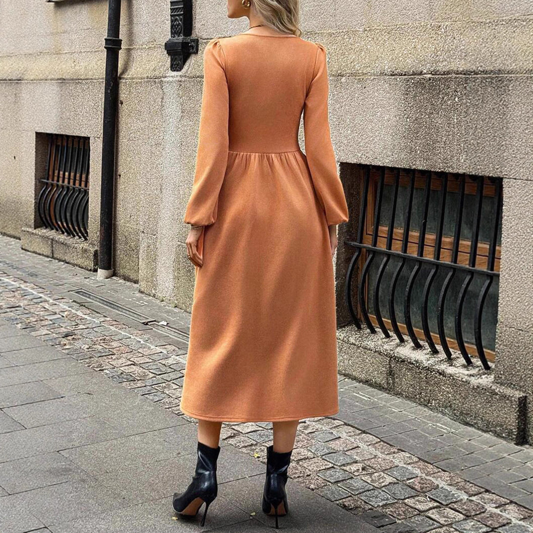 Damer Eleganta Midi-klänning med knapplist och puffärmar Mirla-Eva Jonsson
