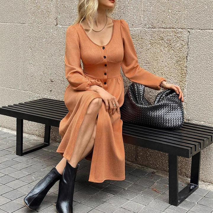 Damer Eleganta Midi-klänning med knapplist och puffärmar Mirla-Eva Jonsson