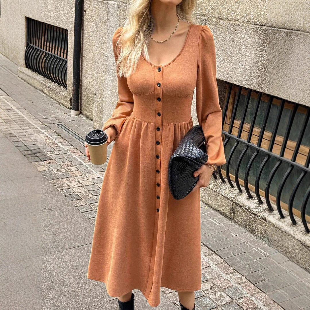 Damer Eleganta Midi-klänning med knapplist och puffärmar Mirla-Eva Jonsson