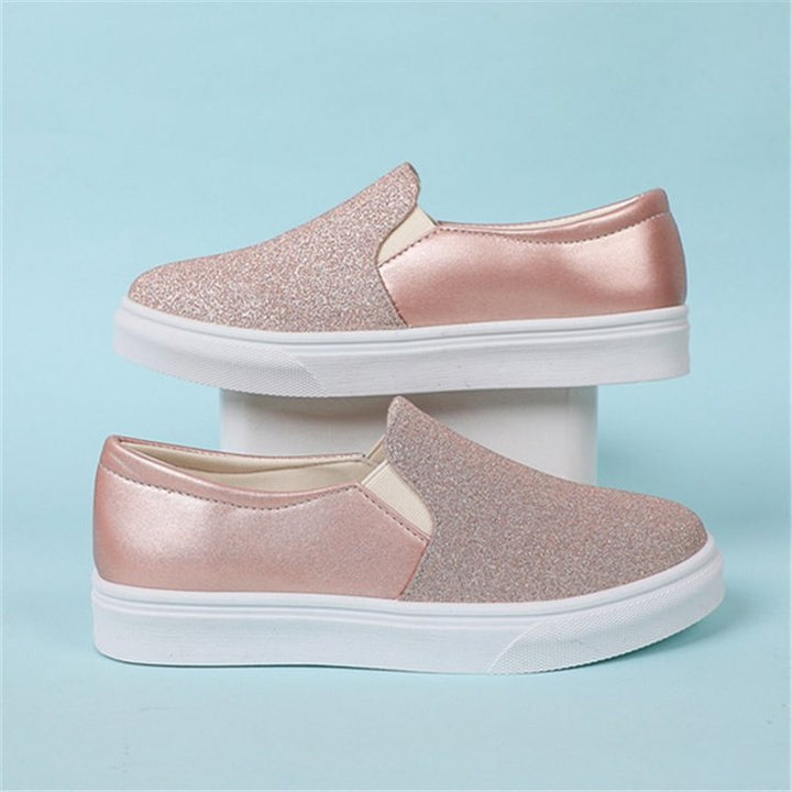 Damer Eleganta Slip-On Sneakers med Glittrande Yta och Halkfri Sula Mirla-Eva Jonsson