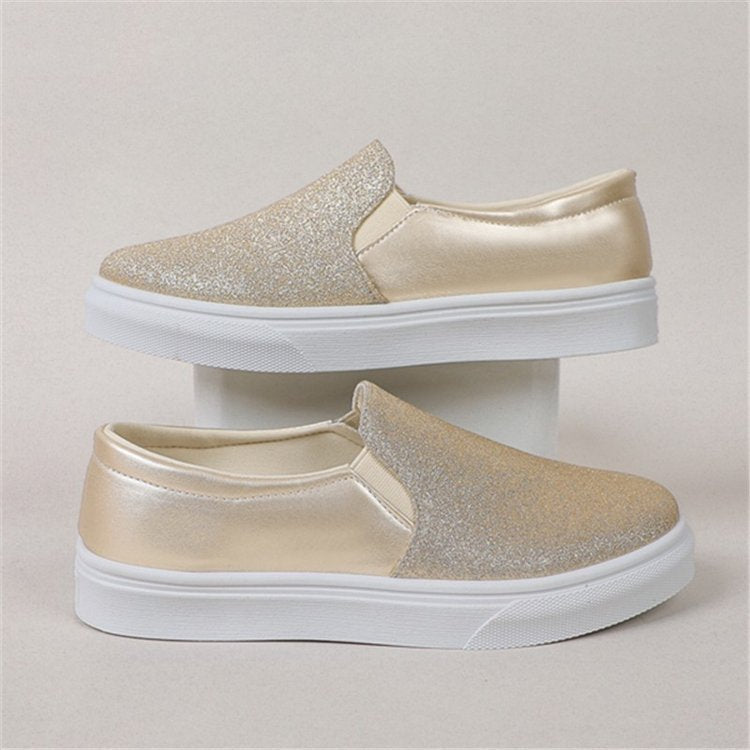 Damer Eleganta Slip-On Sneakers med Glittrande Yta och Halkfri Sula Mirla-Eva Jonsson
