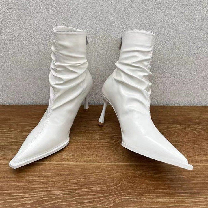 Damer Eleganta Stövletter med Spetsig Tåområde och Avslappnad Slip-On Design Mirla-Eva Jonsson