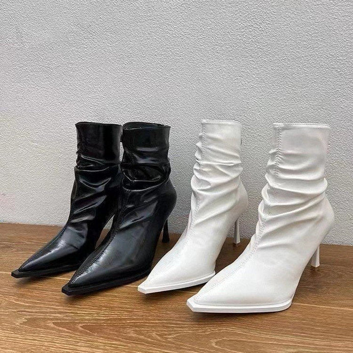 Damer Eleganta Stövletter med Spetsig Tåområde och Avslappnad Slip-On Design Mirla-Eva Jonsson