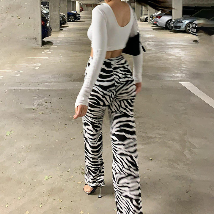 Damer Eleganta Zebra-tryck Högmidjade Byxor Mirla-Eva Jonsson