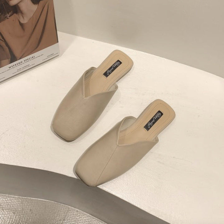 Damer Eleganta och Moderna Mules med Utstickande Över-Kors Design Mirla-Eva Jonsson