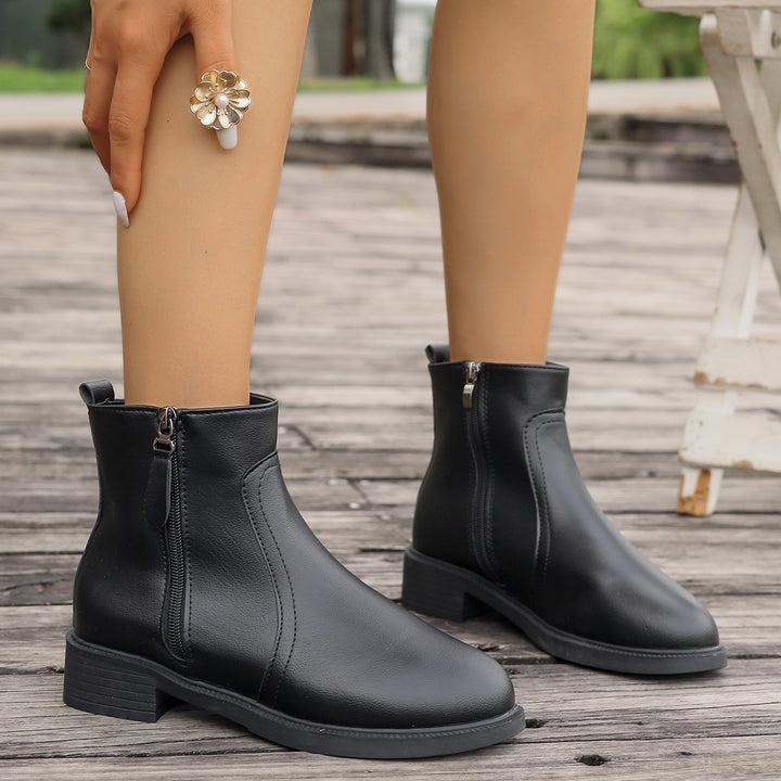Damer Eleganta stövletter med dragkedja och modernt design Mirla-Eva Jonsson