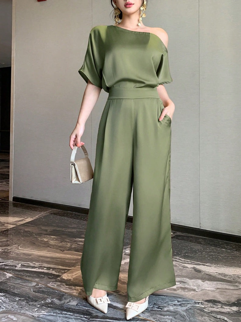 Damer En axel jumpsuit med vid ben och elegant snitt Mirla-Eva Jonsson