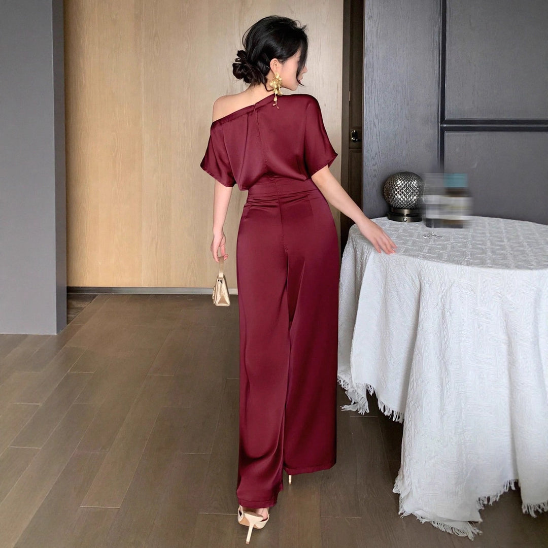 Damer En axel jumpsuit med vid ben och elegant snitt Mirla-Eva Jonsson