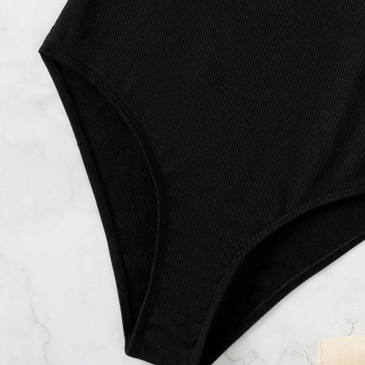Damer En-delad baddräkt med elegant volangdetalj Mirla-Eva Jonsson