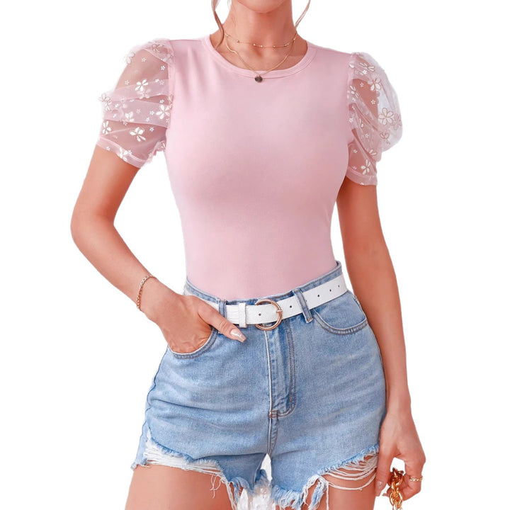 Damer Färgglad T-shirt med puffärmar och blommönster Mirla-Eva Jonsson