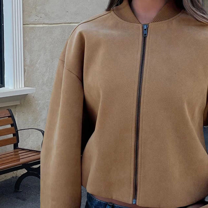 Damer Fashion kortskuren lammskinnjacka med voluminösa ärmar Mirla-Eva Jonsson