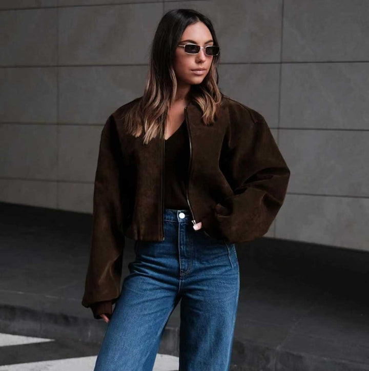 Damer Fashion kortskuren lammskinnjacka med voluminösa ärmar Mirla-Eva Jonsson