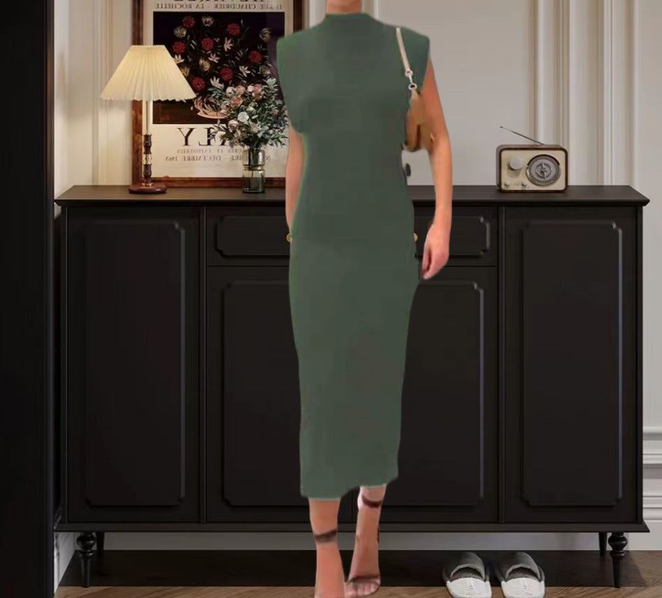 Damer Figurnära Maxiklänning med asymmetrisk design och elegant halsprydnad Eva Jonsson-Eva Jonsson