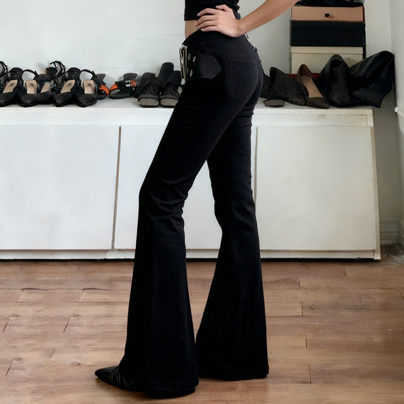 Damer Flared Jeans med justerbart bälte och modernt hål-design Mirla-Eva Jonsson