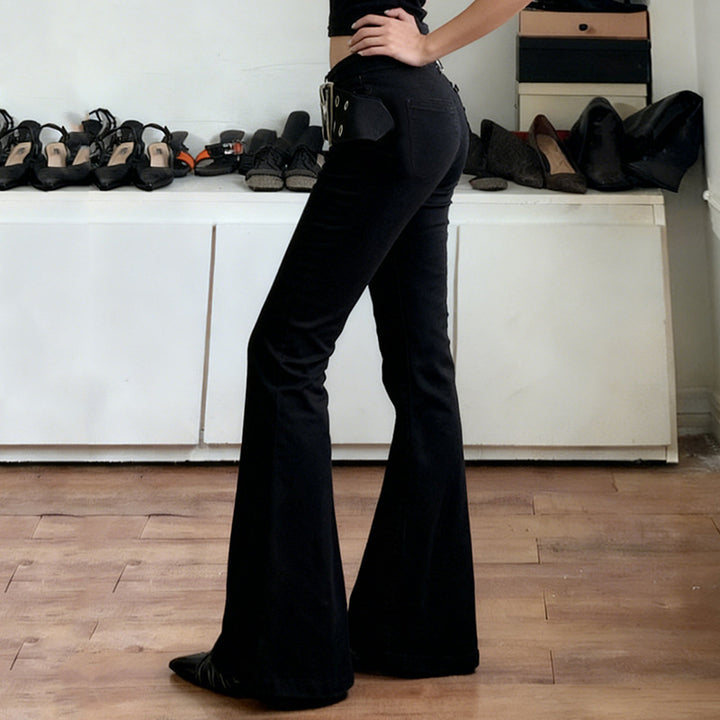 Damer Flared Jeans med justerbart bälte och modernt hål-design Mirla-Eva Jonsson